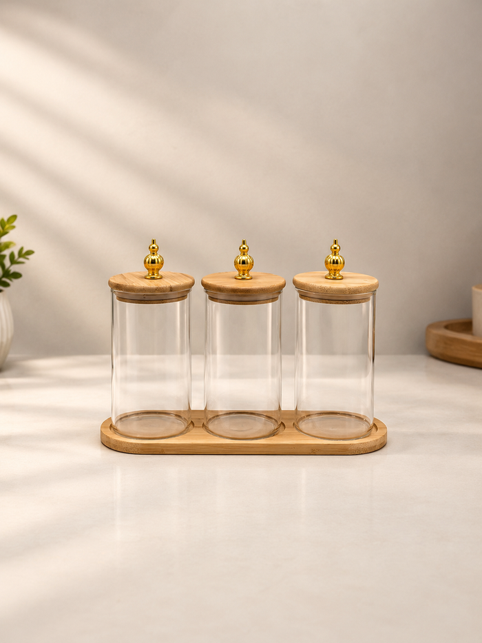 Tall glass jar set with gold knob lids