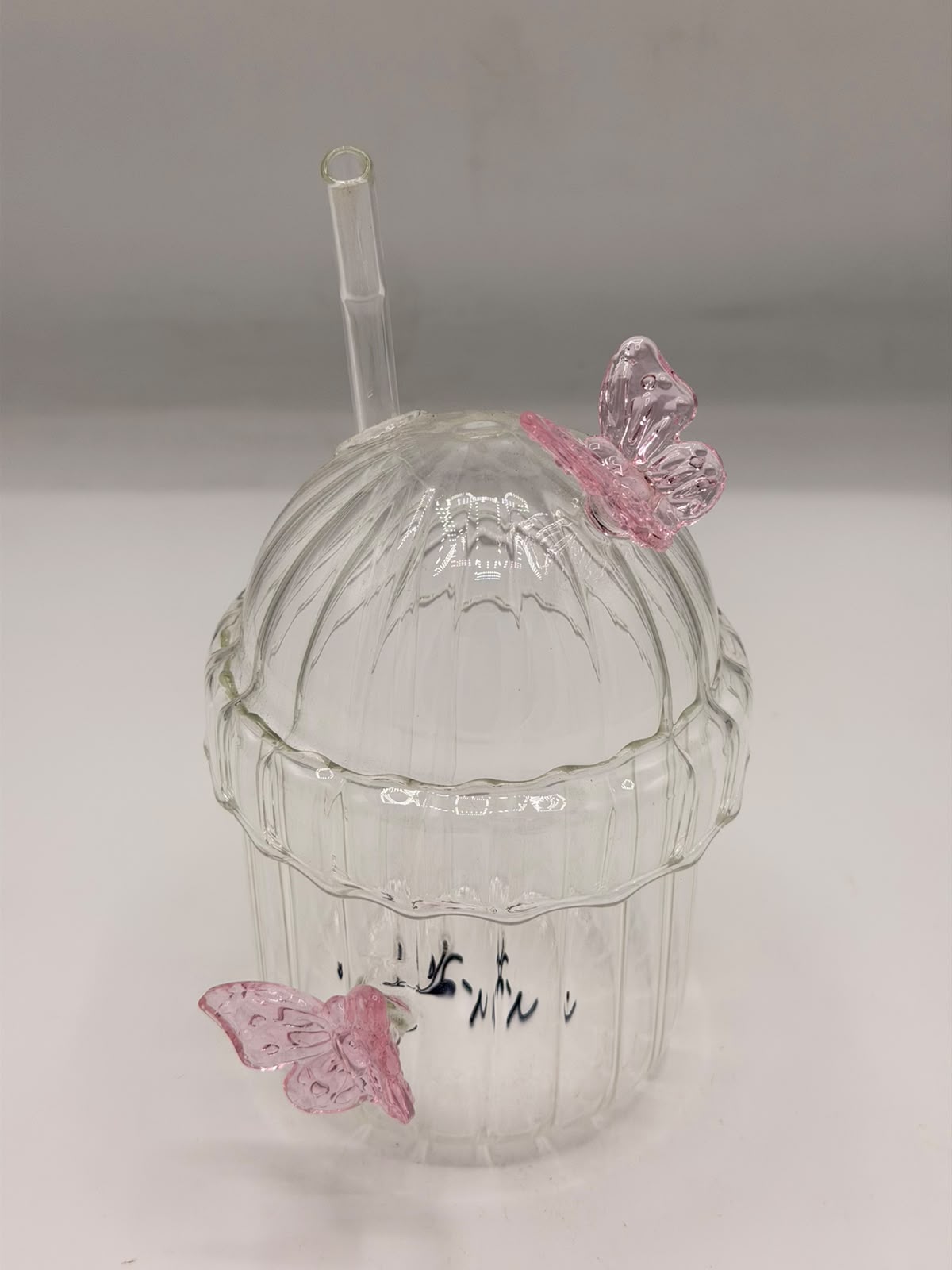 Butterfly sipper glass