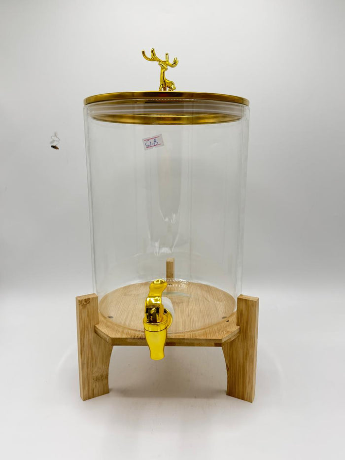 Gold stag glass dispenser on wooden stand