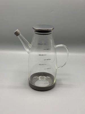 Glass pitcher with chrome lid