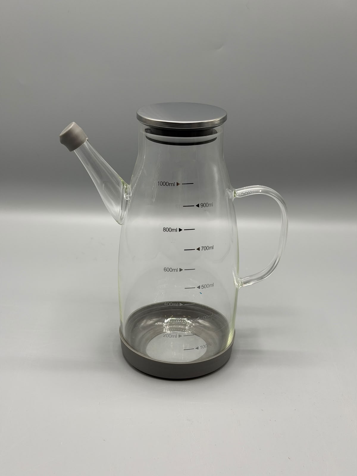 Glass pitcher with chrome lid
