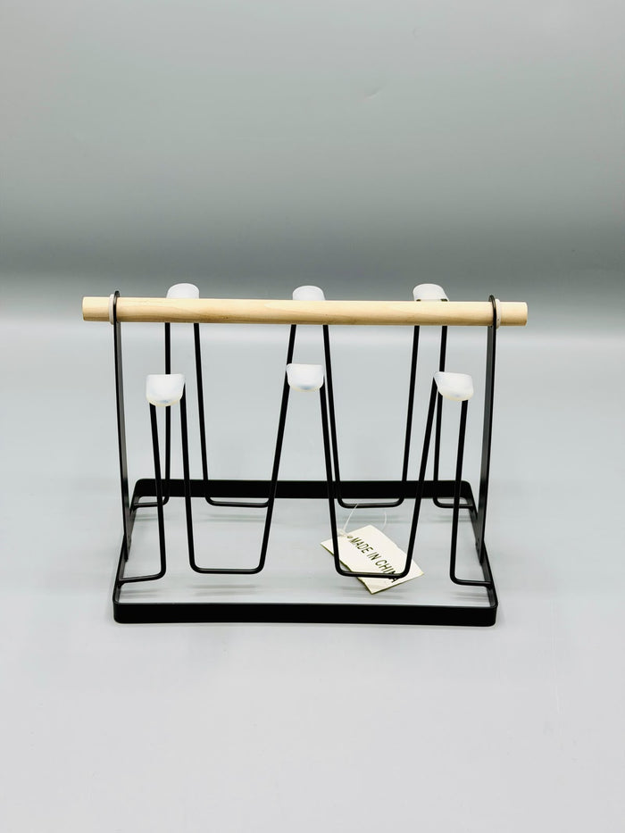Black Metal Glass Stand holding drinking glasses
